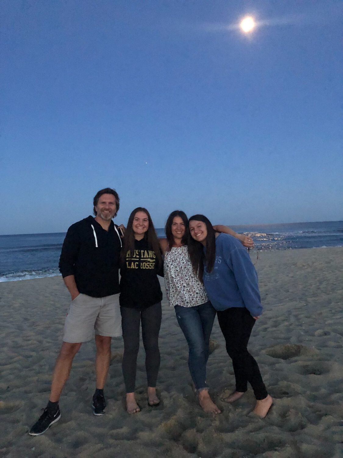 evenflow interiors family shot on beach interior designer on jersey shore with her family